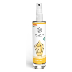 Raumspray von Baldini in einer transparenten Flasche mit einem Sprühkopf, etikettiert mit dem Schriftzug 'Yogaduft'.