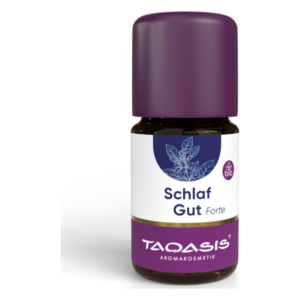 Flasche mit ätherischem Öl "Schlaf Gut Forte" von TAAQASIS in einer dunklen Glasflasche mit lila Deckel.