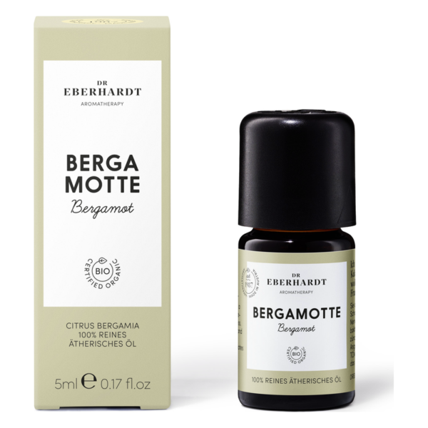 Flasche mit ätherischem Öl Bergamot in einer umweltfreundlichen Verpackung, dekorativ beschriftet.