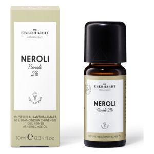Flasche mit 10 ml Neroli-Öl (2%) neben der grünen Verpackung, beide mit klaren Beschriftungen.