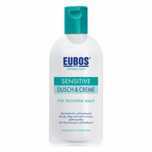 Flasche EUBOS Sensitive Dusch & Creme für trockene Haut mit grünem Deckel und Pflegehinweisen auf dem Etikett.