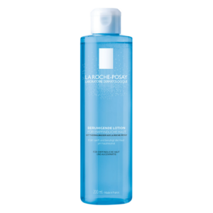 Transparente Flasche mit beruhigender Lotion für empfindliche Haut, hergestellt mit Thermalwasser, 200 ml.