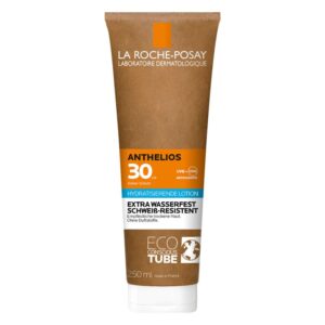 Sonnenlotion in einem braunen, umweltbewussten Tubus mit blauer und orangefarbener Beschriftung, 250 ml Inhalt.